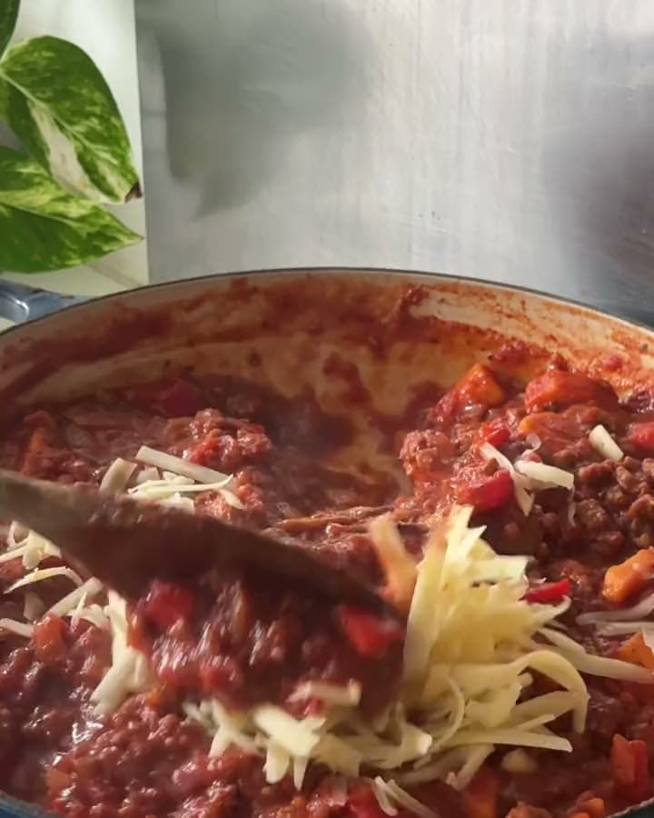 A spoonful of Organised going into a pan of chilli con carne