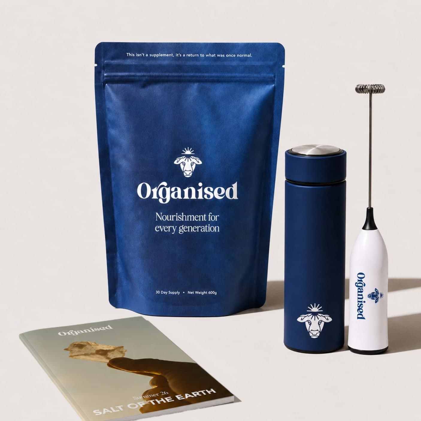 The Organised pouch with the steel bottle, electric whisk and seasonal zine