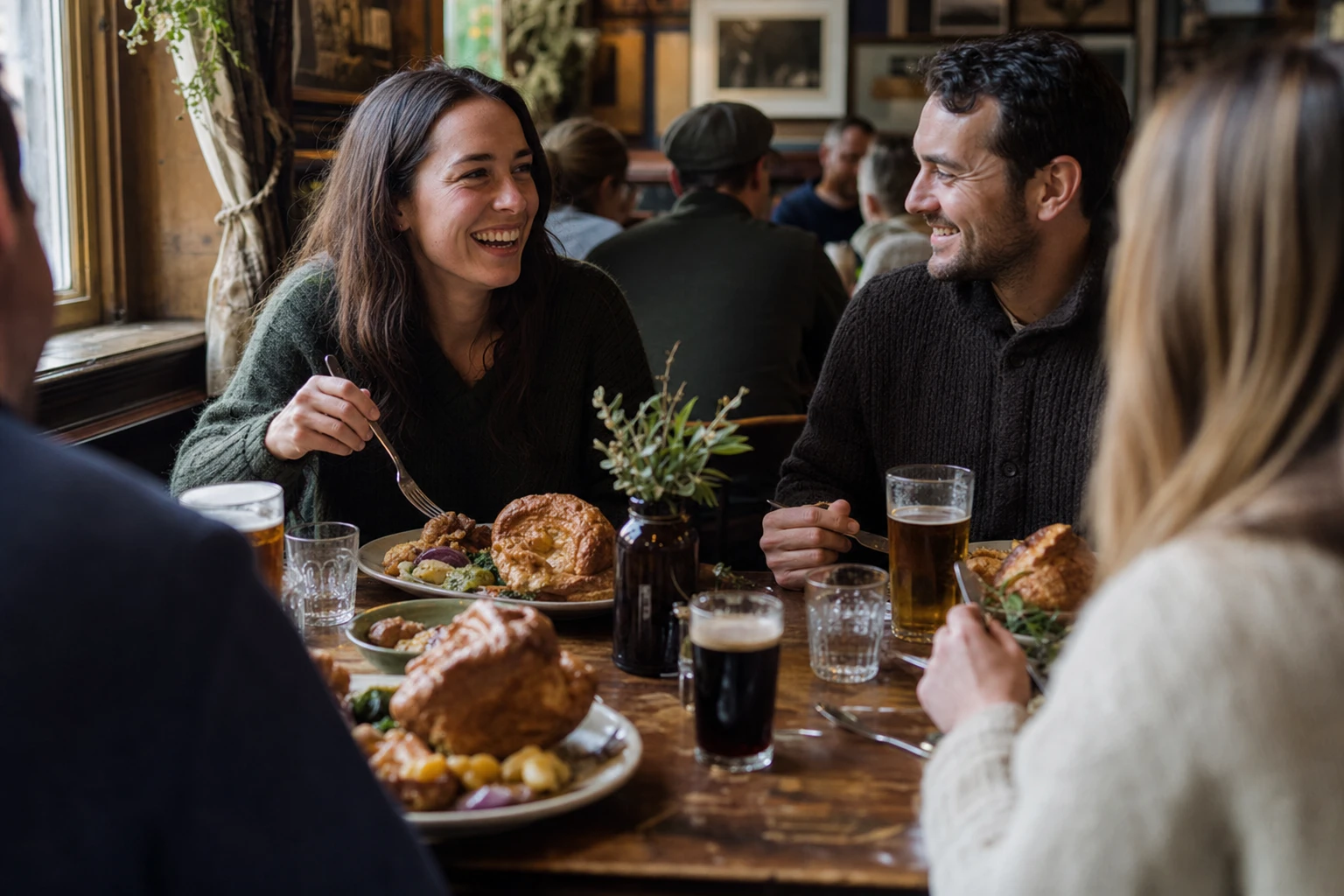 Traditional British pub interior, food on table, social gathering