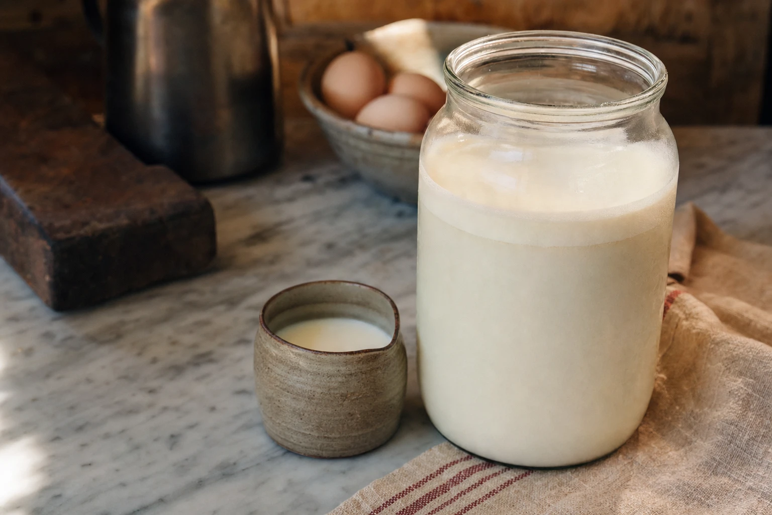 Fresh raw milk showing cream layer